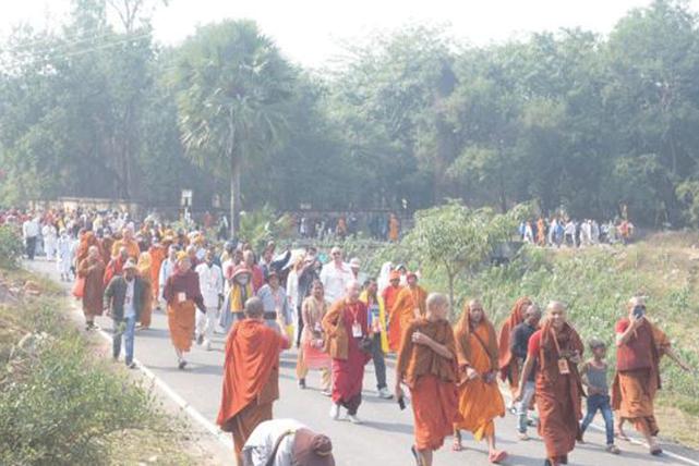 Over 1,500 monks, nuns and devotees from 15 countries march from Jethian to Rajgir in Bihar on Wednesday.
